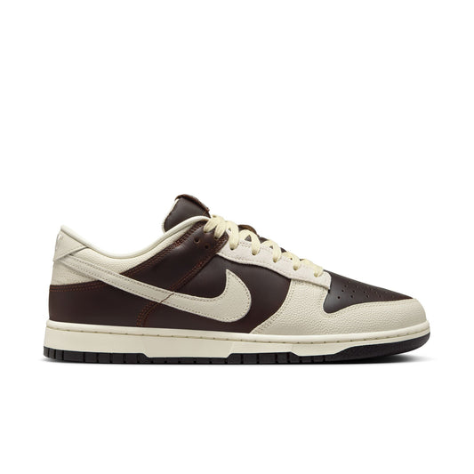 Brown and beige Nike Dunk Low with Nike logo on a white background