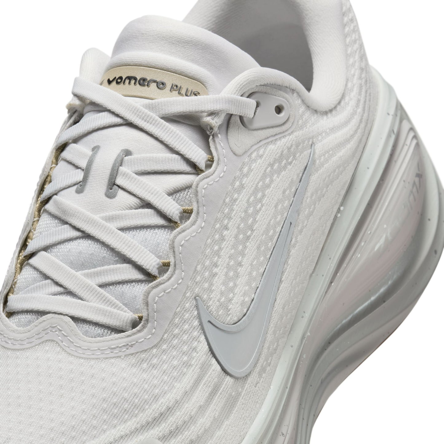 White running shoe with Nike logo on a white background