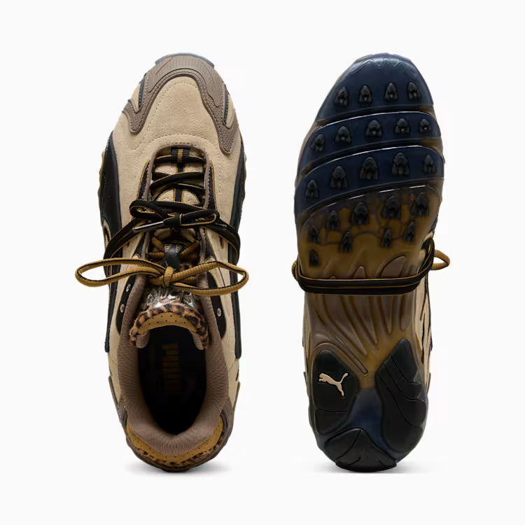 Pair of brown and black sneakers with a visible brand logo on a white background