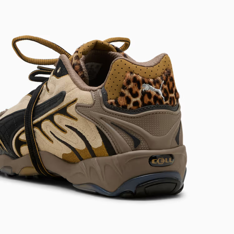 Sneaker with leopard print accents on a white background