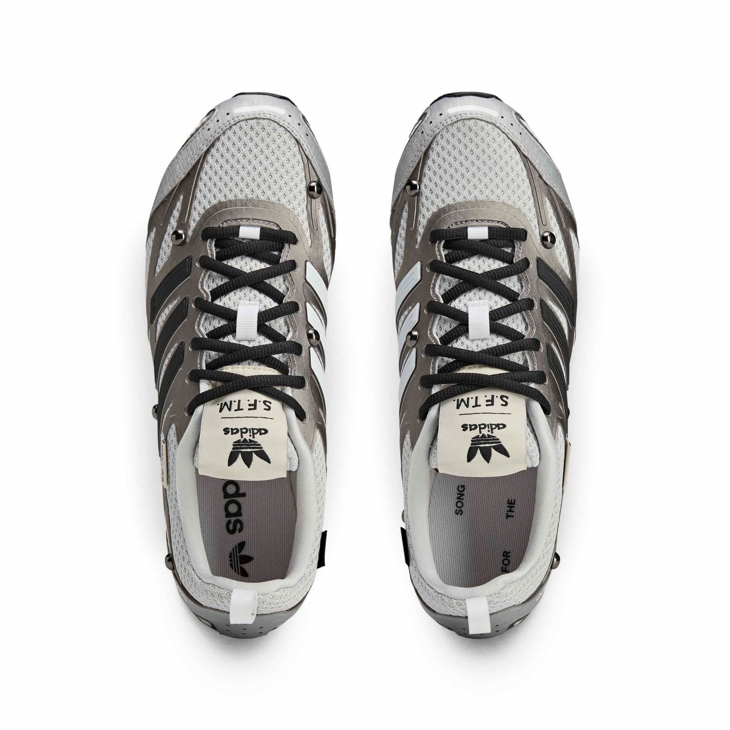 Pair of gray and black athletic shoes on a white background