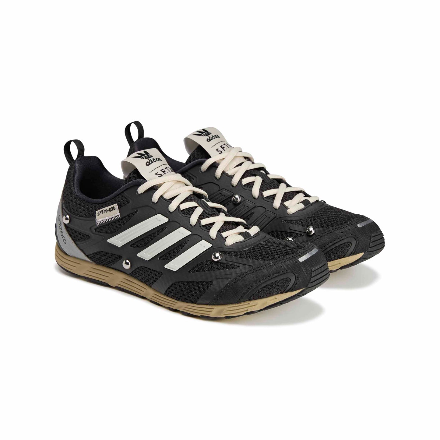 Black and white athletic shoes with visible branding on a white background