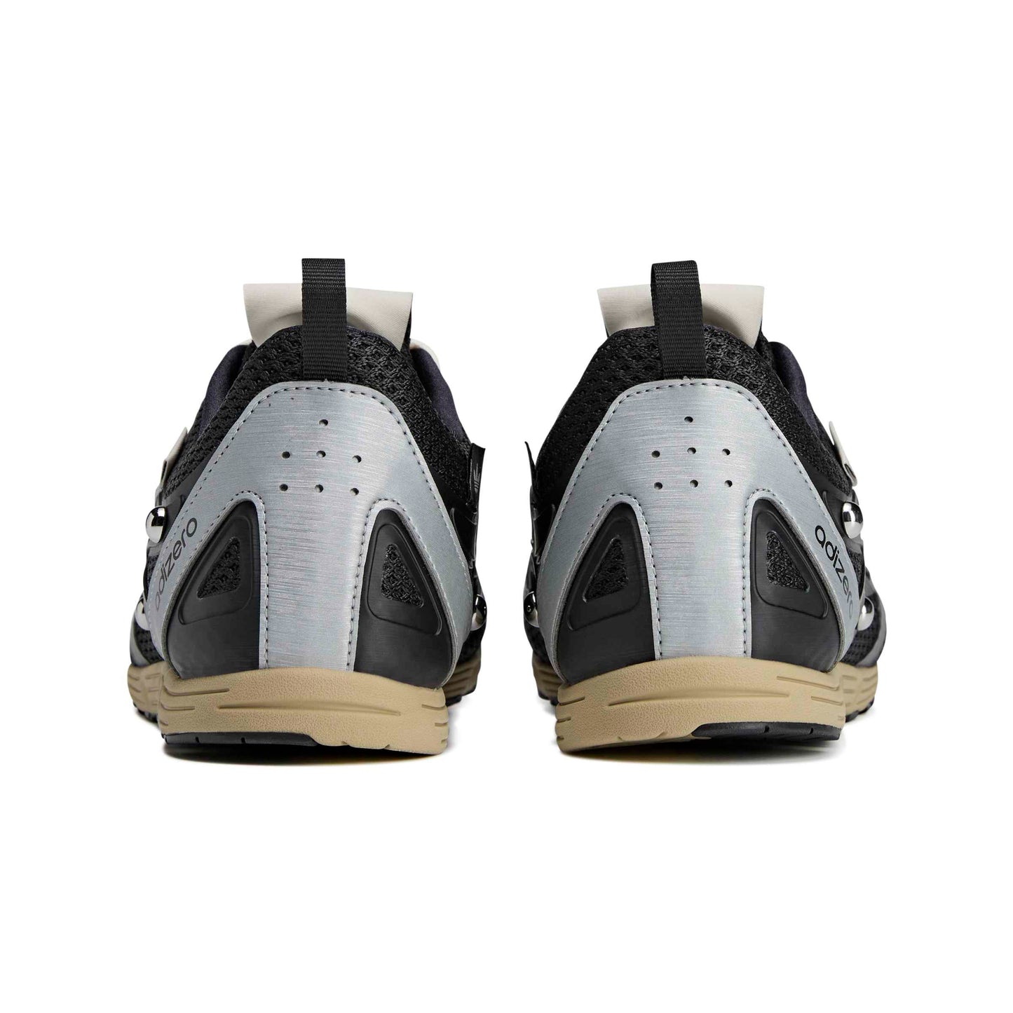 Black and gray athletic shoes with a visible brand logo on a white background