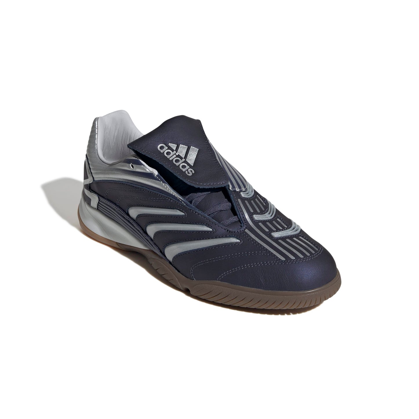 Navy and gray Adidas sneaker on a white background