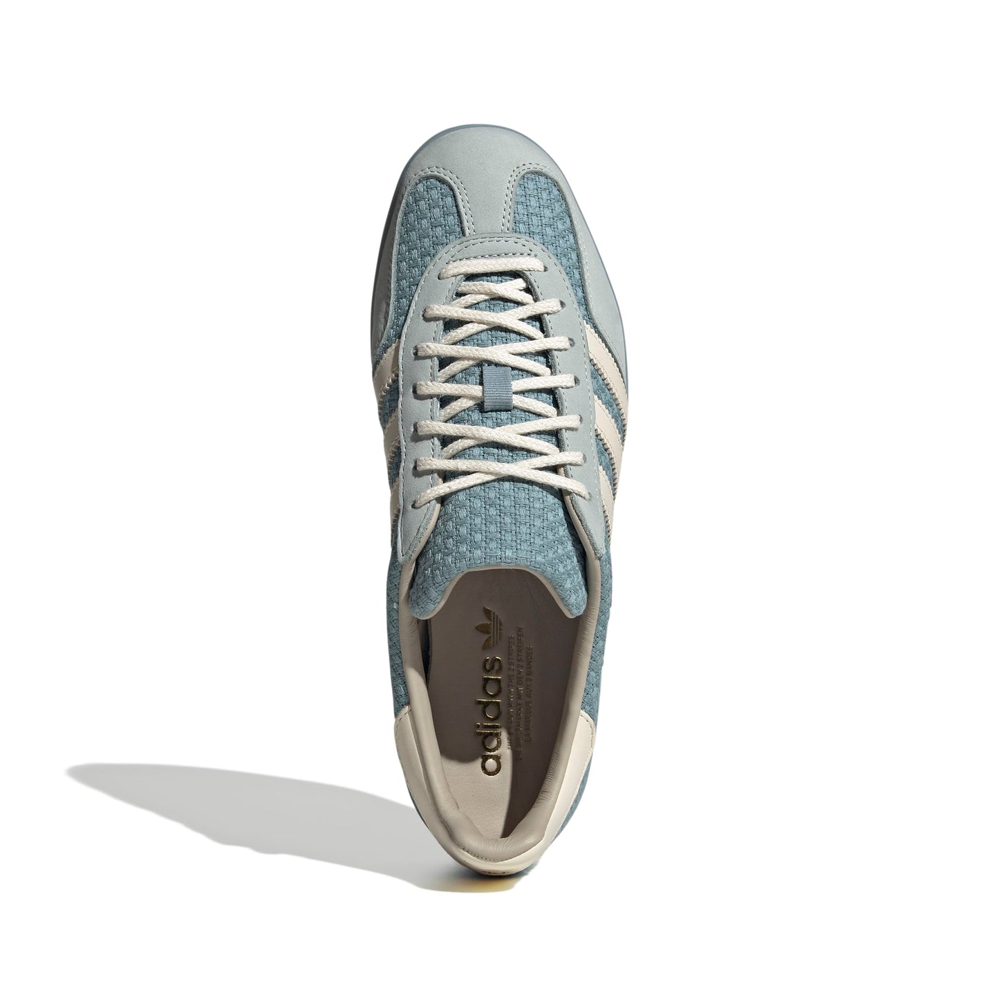 light blue Adidas sneaker on a white background