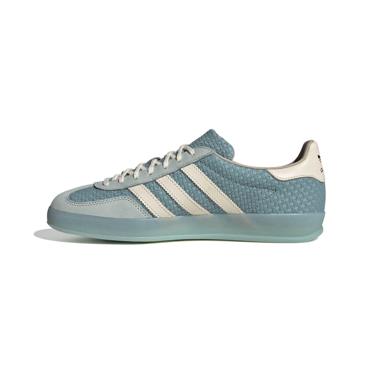 Blue Adidas sneaker with white stripes on a white background