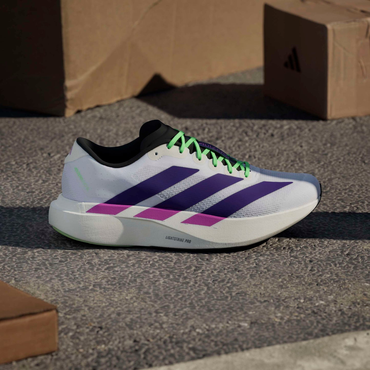 ADIDAS adizero Evo SL M FTWWHT/CPURLP/LIMBUR JS4495