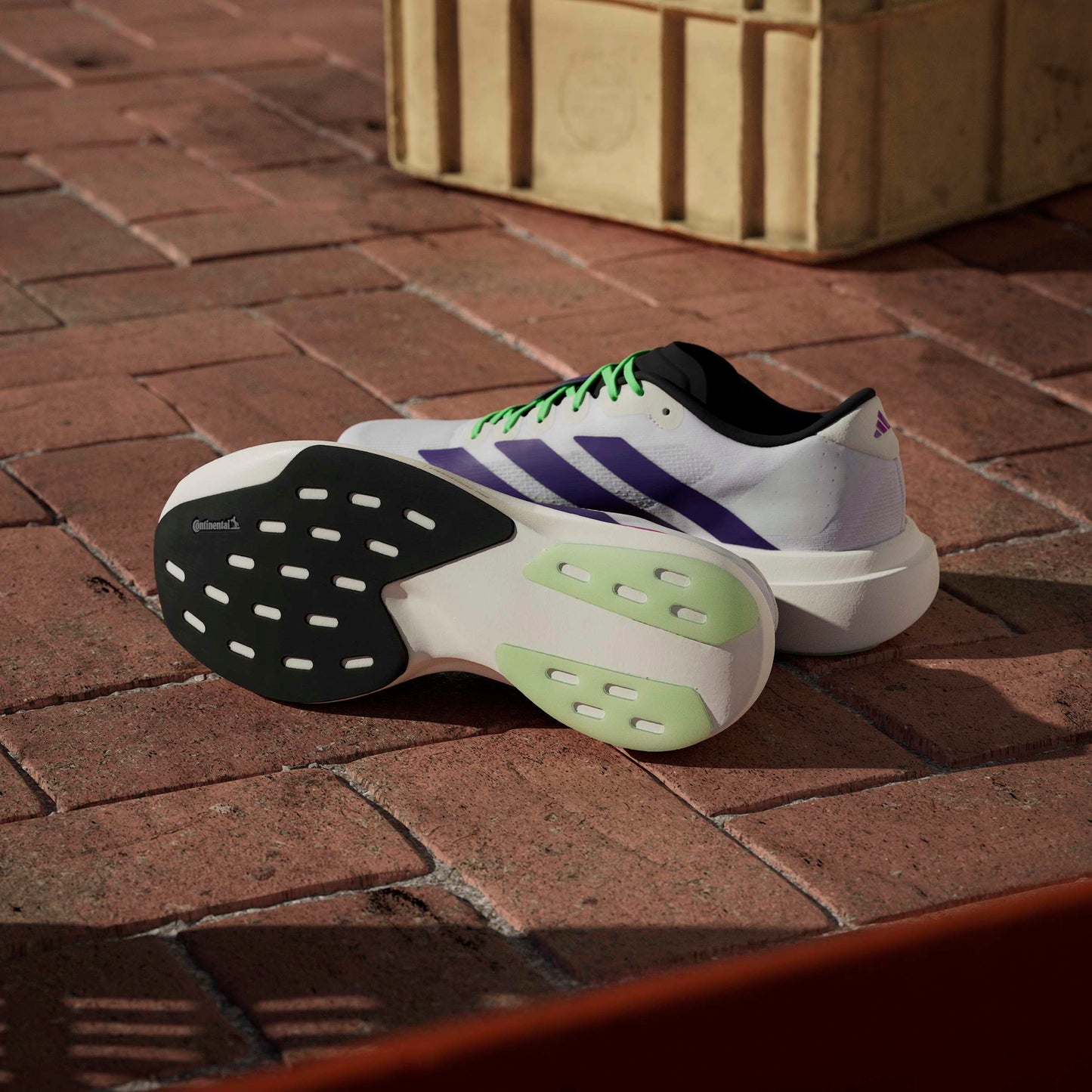 ADIDAS adizero Evo SL M FTWWHT/CPURLP/LIMBUR JS4495