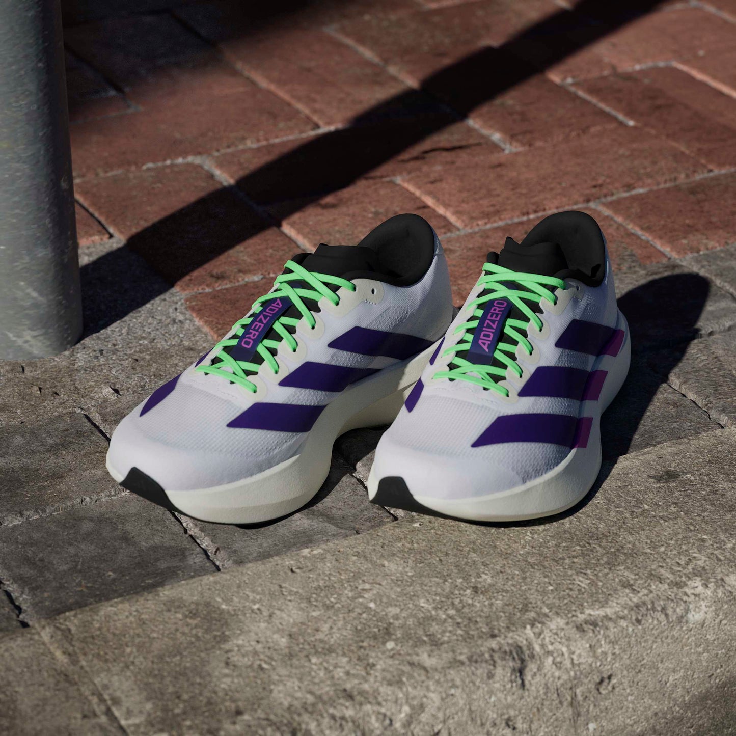 ADIDAS adizero Evo SL M FTWWHT/CPURLP/LIMBUR JS4495