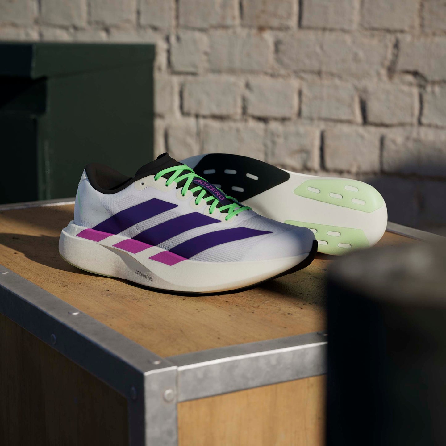 ADIDAS adizero Evo SL M FTWWHT/CPURLP/LIMBUR JS4495