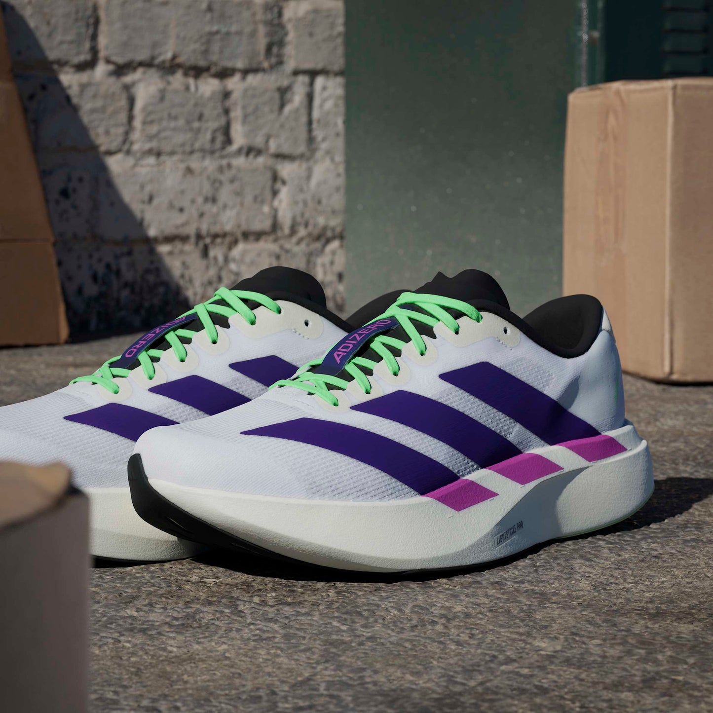 ADIDAS adizero Evo SL M FTWWHT/CPURLP/LIMBUR JS4495