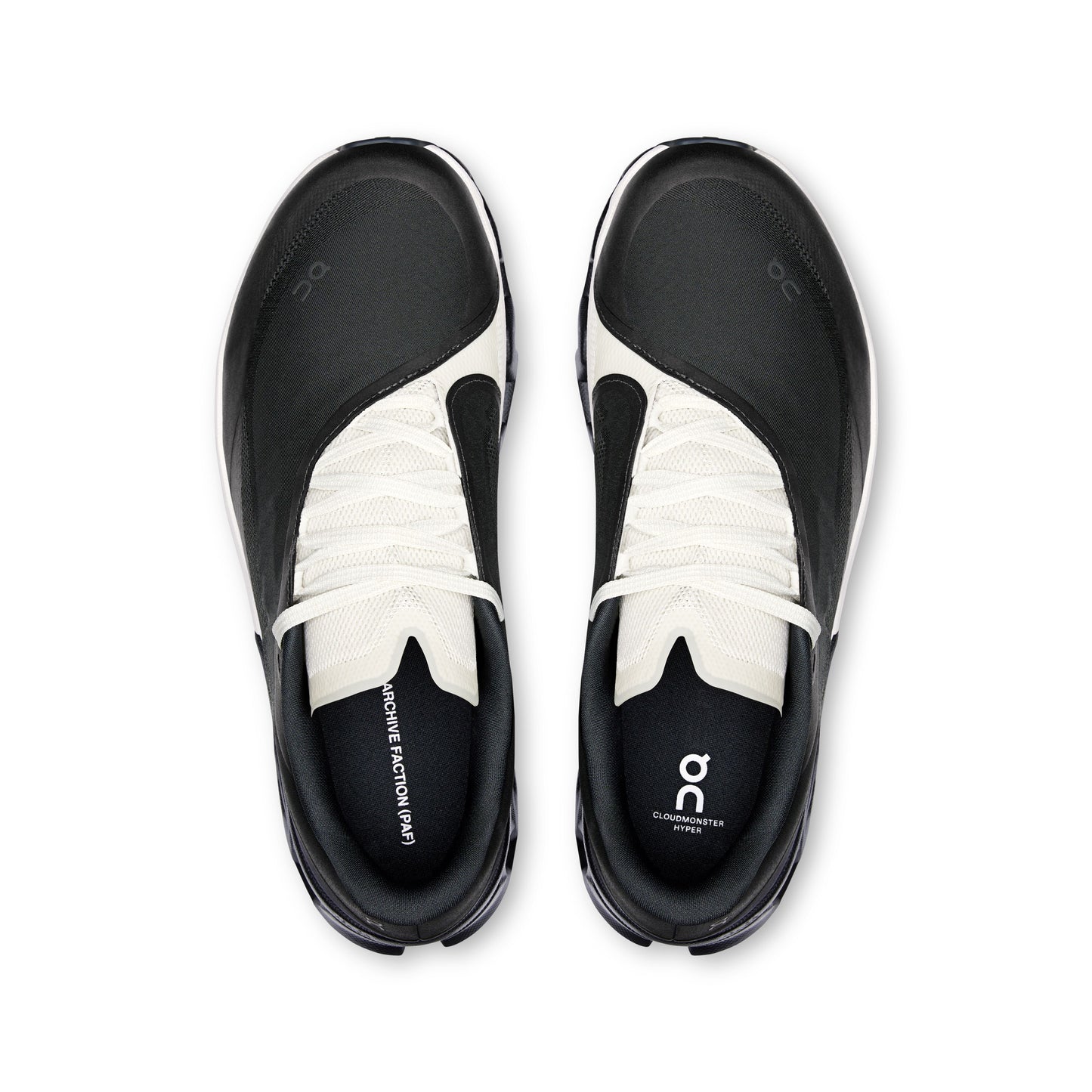 Black and white athletic shoes on a white background
