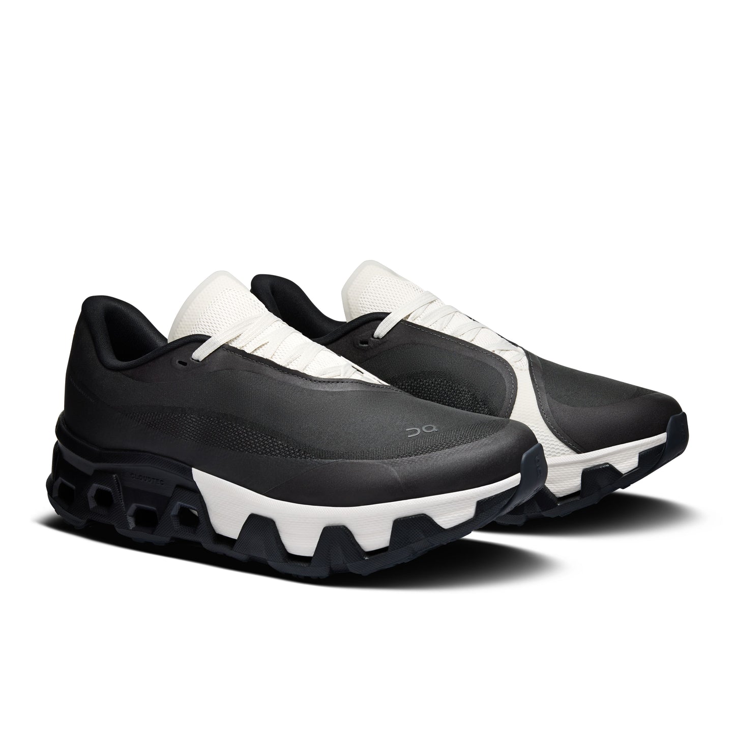 Black and white athletic shoes on a white background