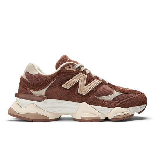 Side profile shot of the New Balance 9060 in a chocolate brown hairy suede, cream sole and light brown N logo on the side
