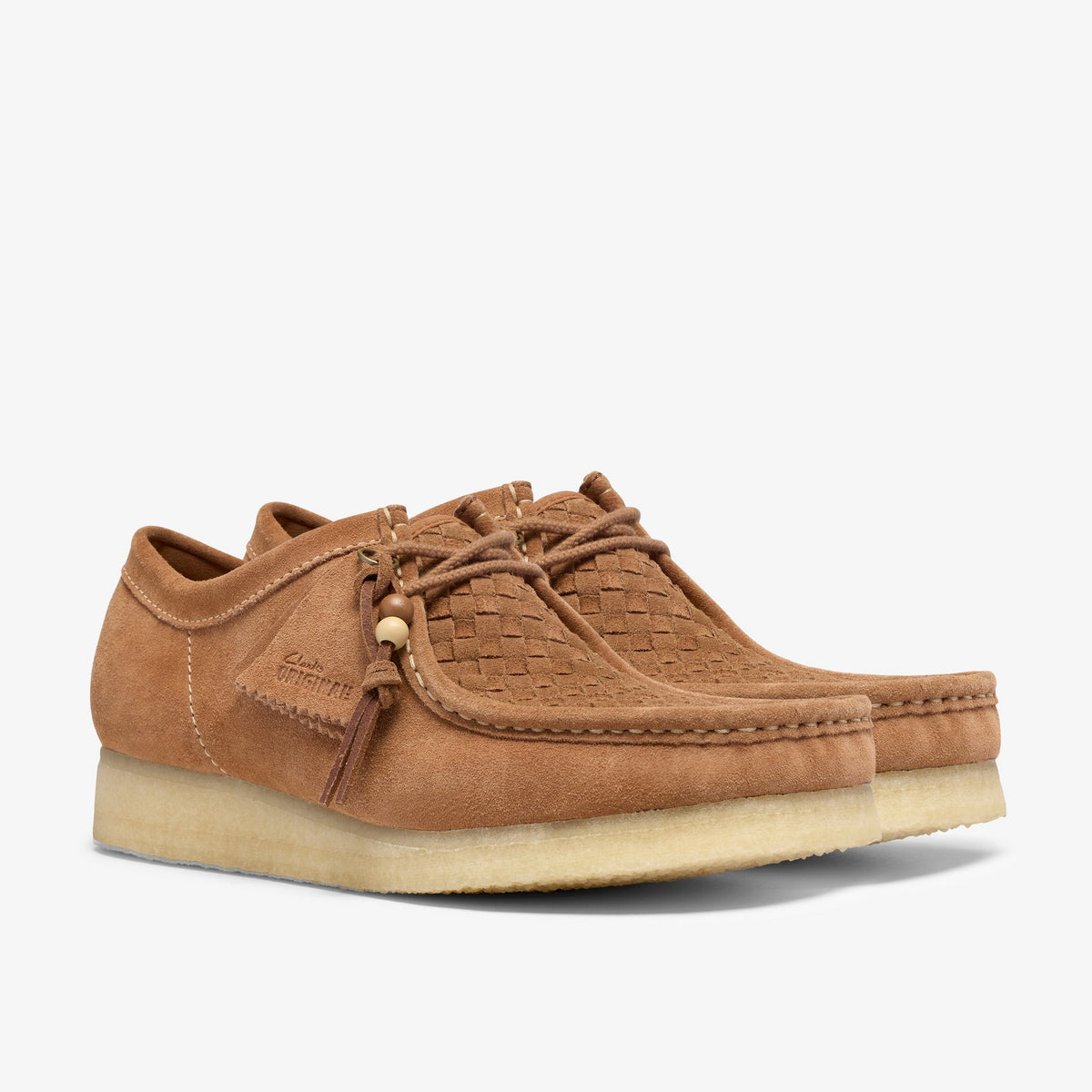 Clarks Originals Wallabee in Tan Weave, pair at an angle with woven suede vamp, bead lace tie and crepe sole