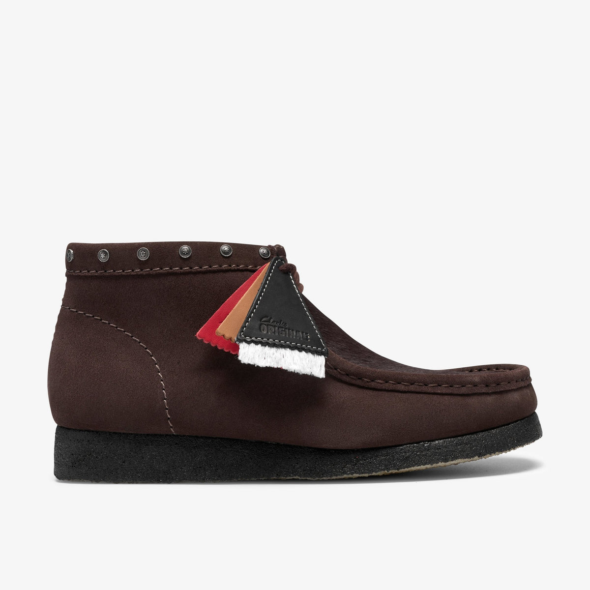 Clarks Wallabee Boot side view in Brown Interest suede with studded collar, layered tags and black crepe sole