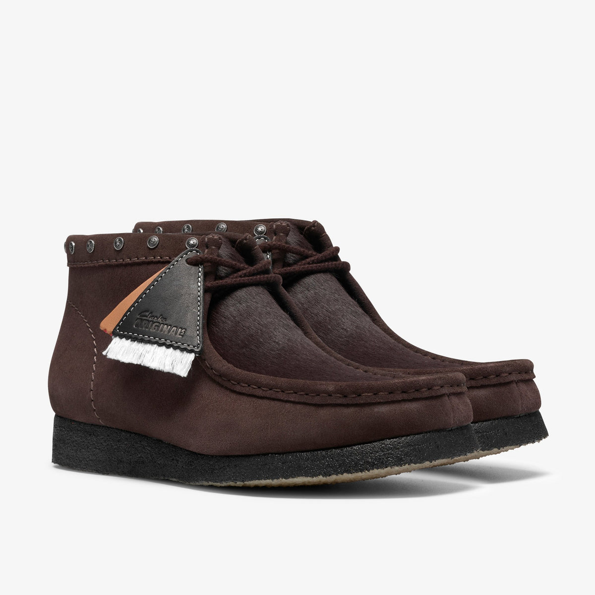 Clarks Wallabee Boot pair in Brown Interest, brown suede with hairy toe, studded collar, and black crepe sole