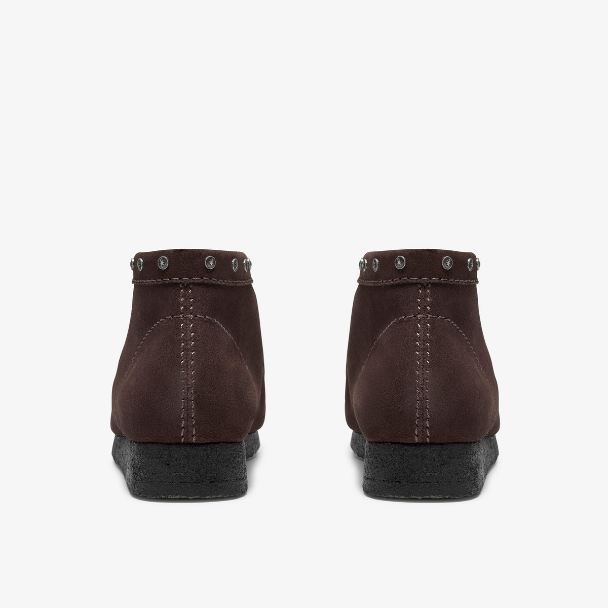 Clarks Wallabee Boot, back view of pair in Brown Interest suede with metal studs at collar and dark crepe soles