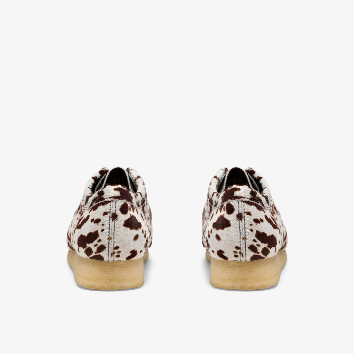 Clarks Originals x Blanch Yu Wallabee back view of pair, Brown Cow Print hair upper with center seam and crepe soles