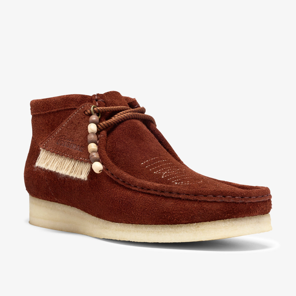 Clarks Wallabee Boot, front angle view in Brown Combination Suede with beaded lace, cream fringe and crepe sole
