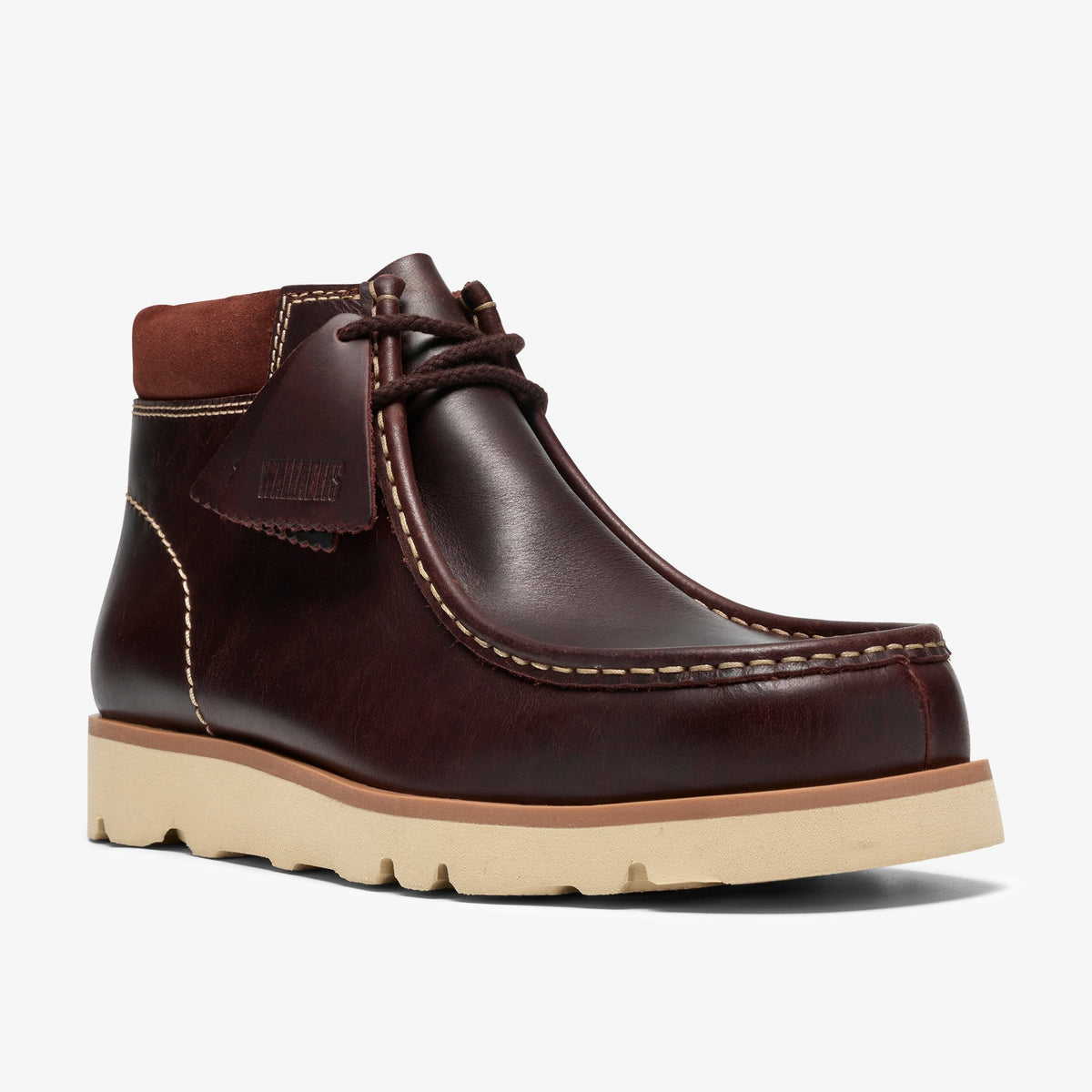 Clarks Walla Orkhon Boot in British Tan, front angle view of burgundy leather moc toe, suede collar, cream lug sole