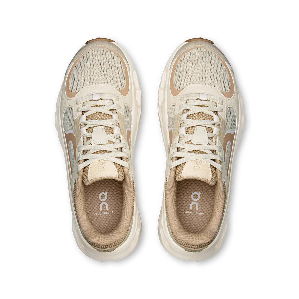 On Cloudtilt Arc in Grain / Ivory, top view of pair showing ivory mesh upper, tan overlays and On logo insoles