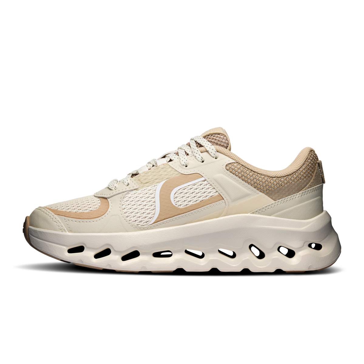 On Cloudtilt Arc side view in Grain / Ivory with tan mesh overlays, white logo and ivory cutout CloudTec sole