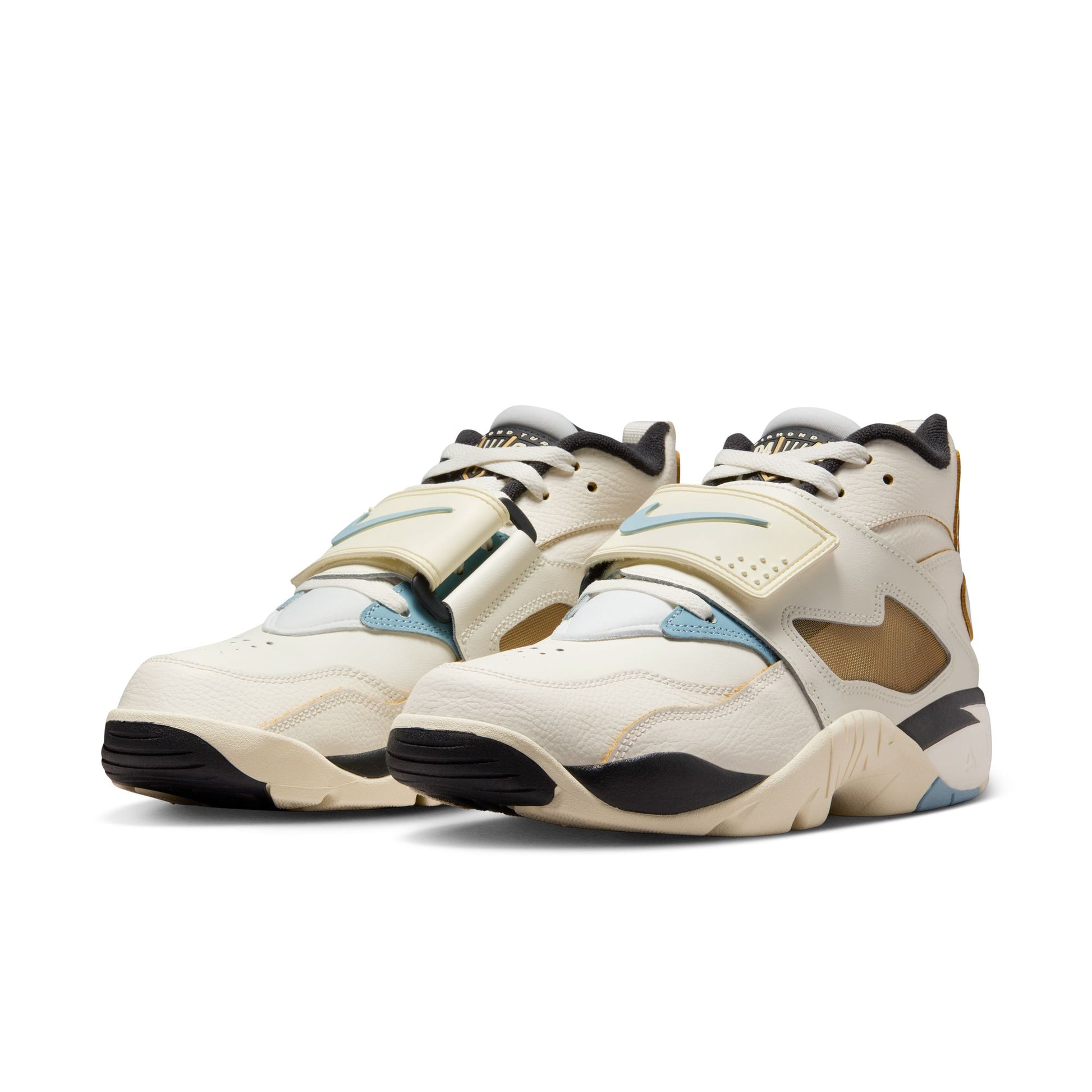 Pair of white and black sneakers with blue accents on a white background