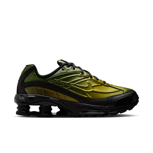 Green and black iridescent Nike Shox Ride 2 sneaker on a white background