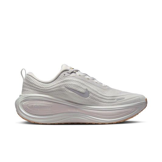White running shoe with Nike logo on a white background