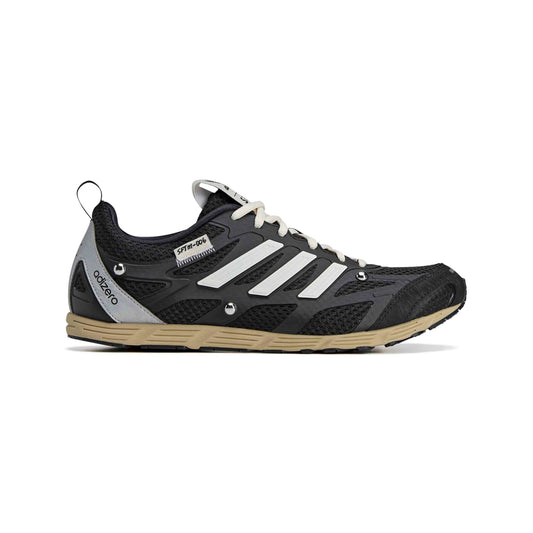 Black and white athletic shoe with visible branding on a white background