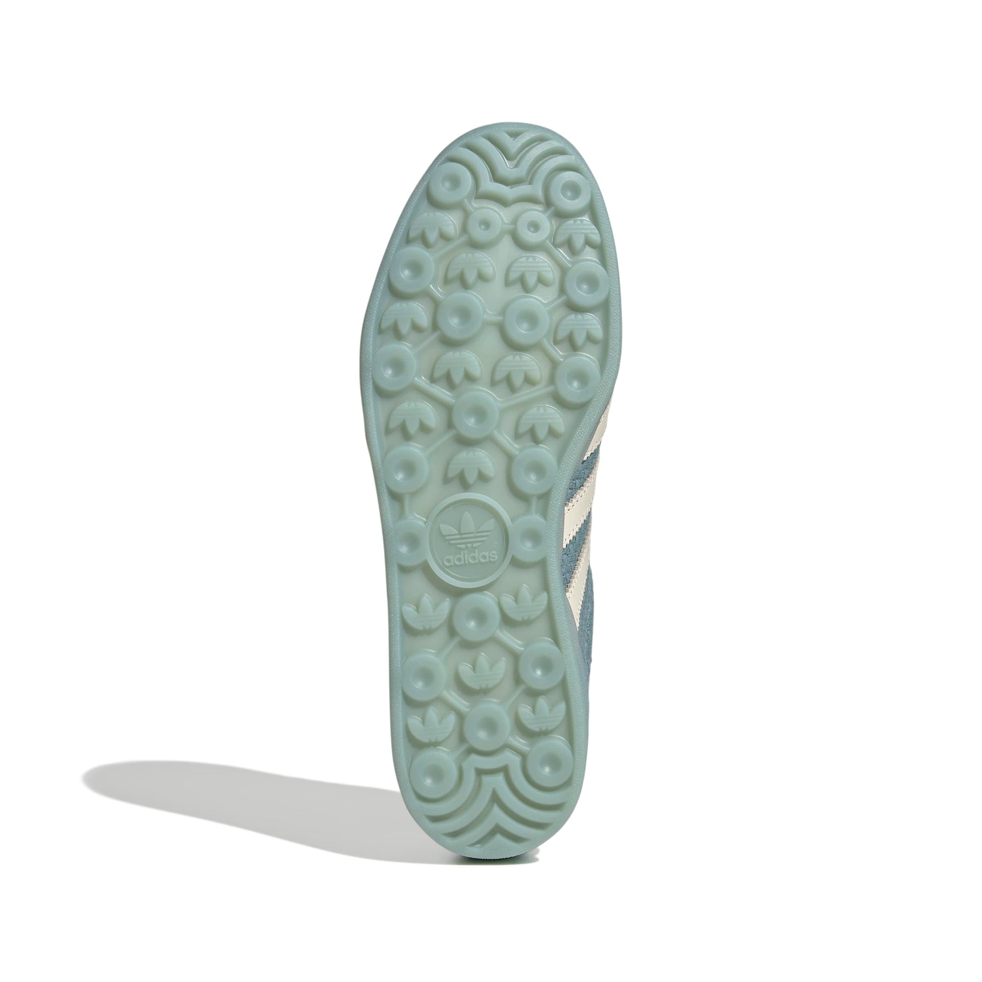 Close-up of an Adidas shoe sole on a white background