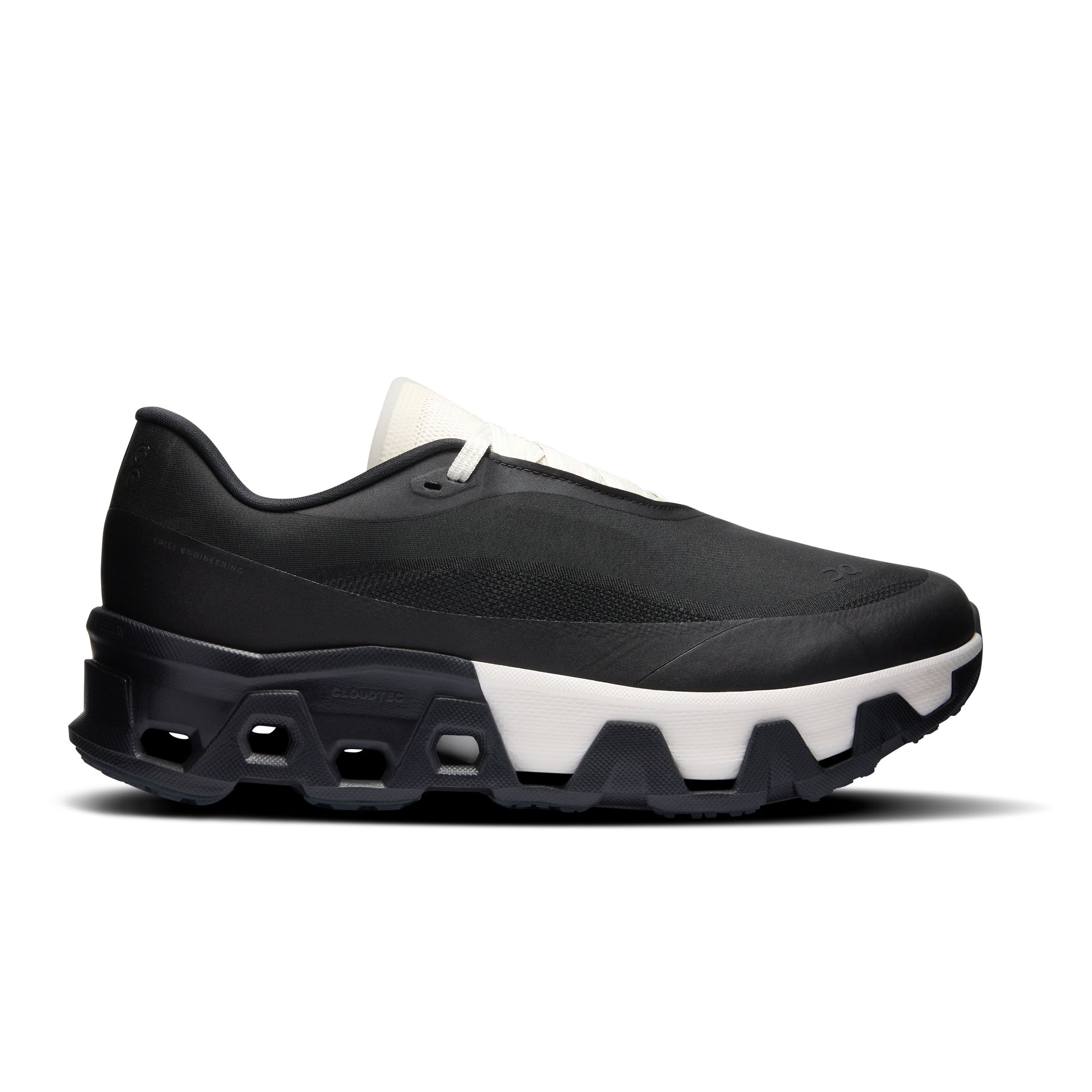 Black sneaker with white sole on a white background