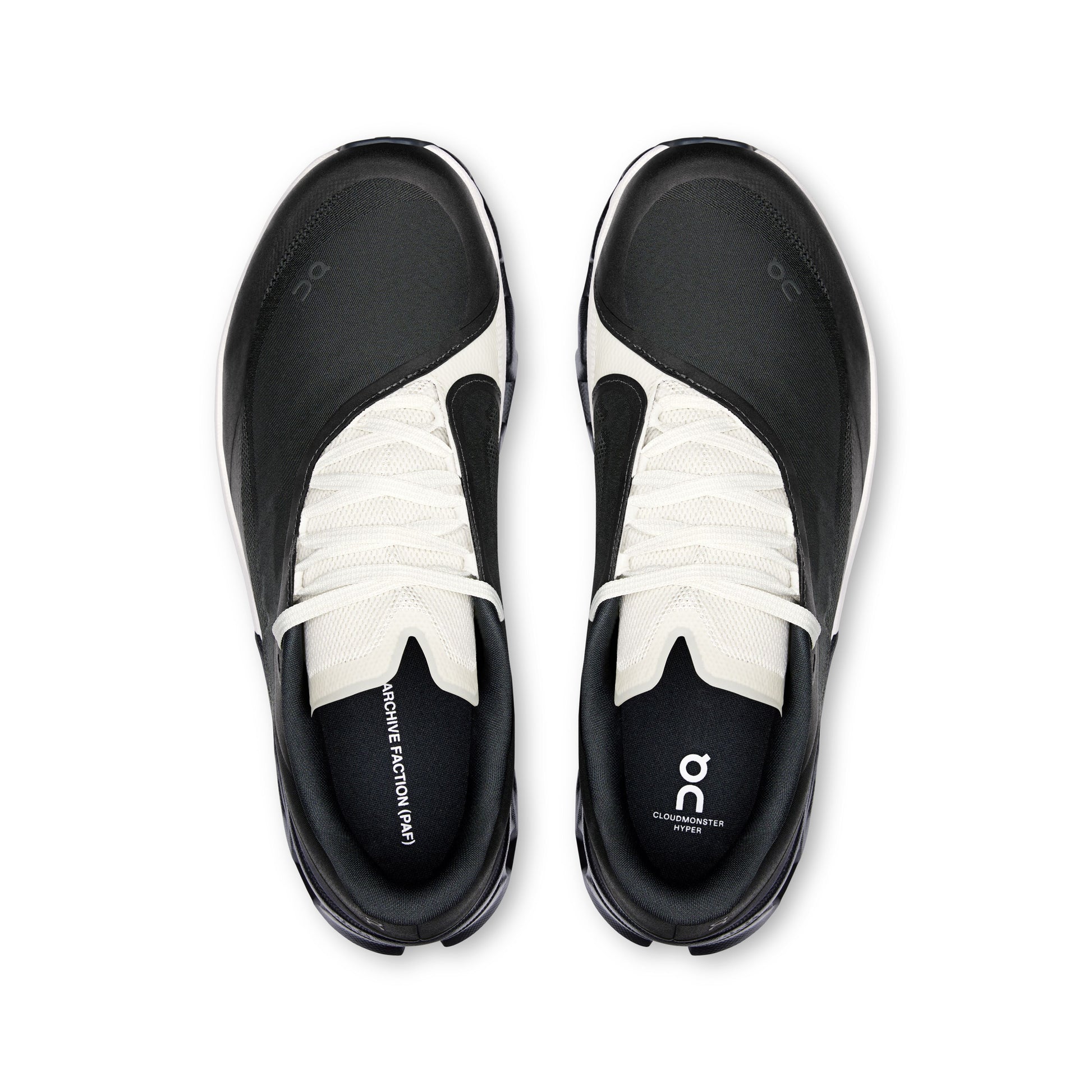Black and white athletic shoes on a white background