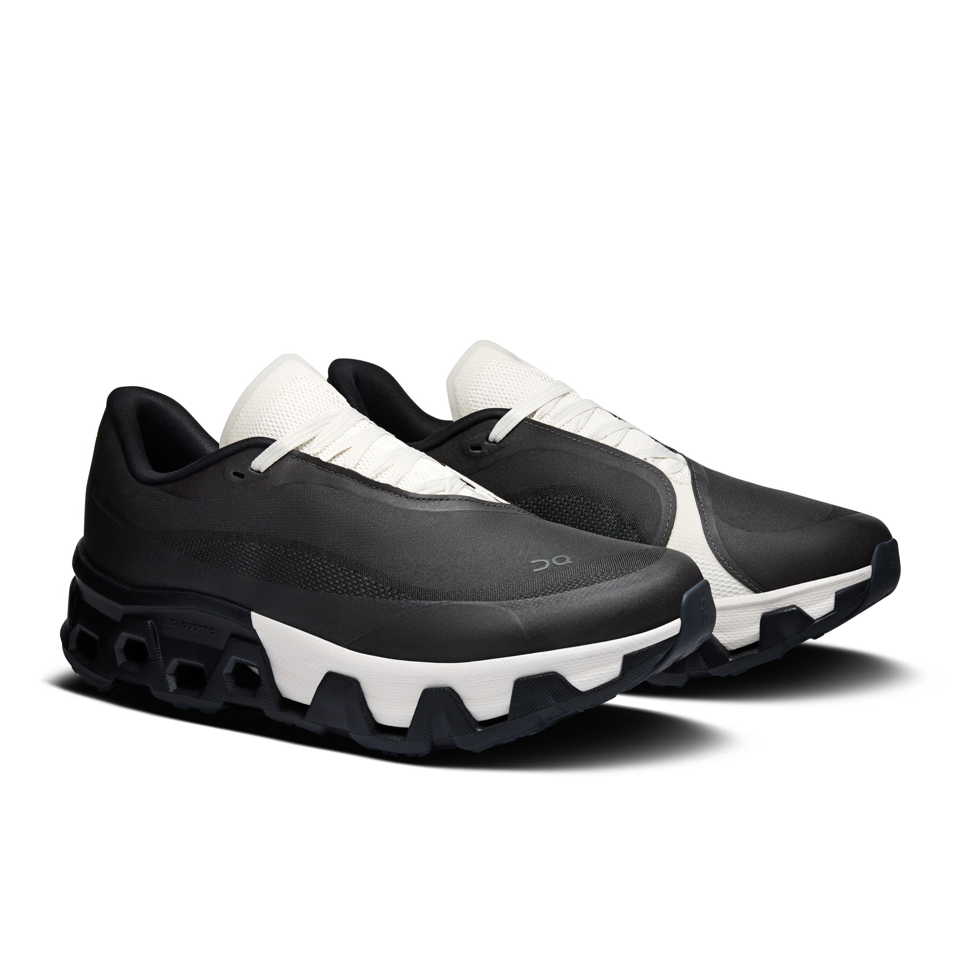 Black and white athletic shoes on a white background