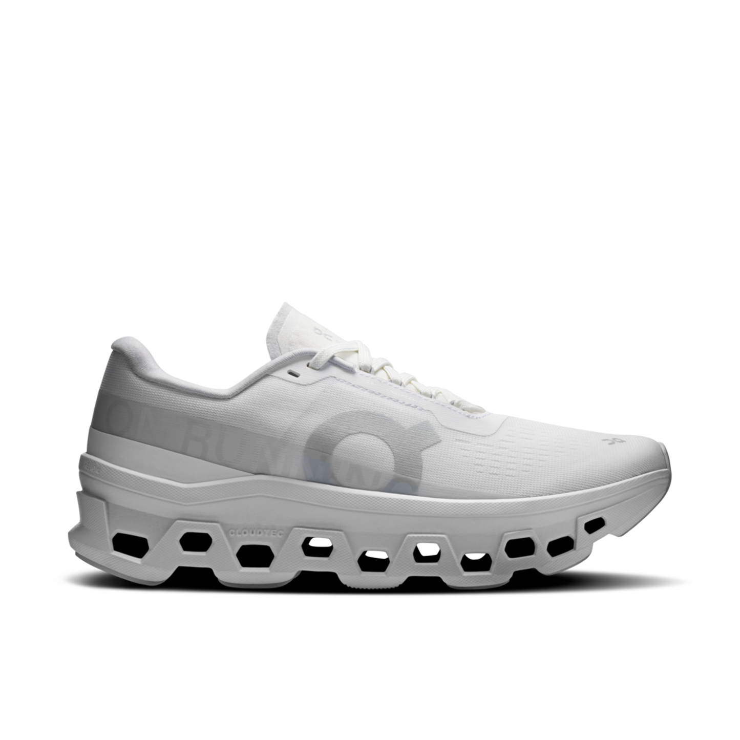 White athletic shoe with unique hexagonal sole design on a white background