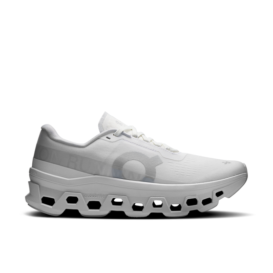 White athletic shoe with unique hexagonal sole design on a white background
