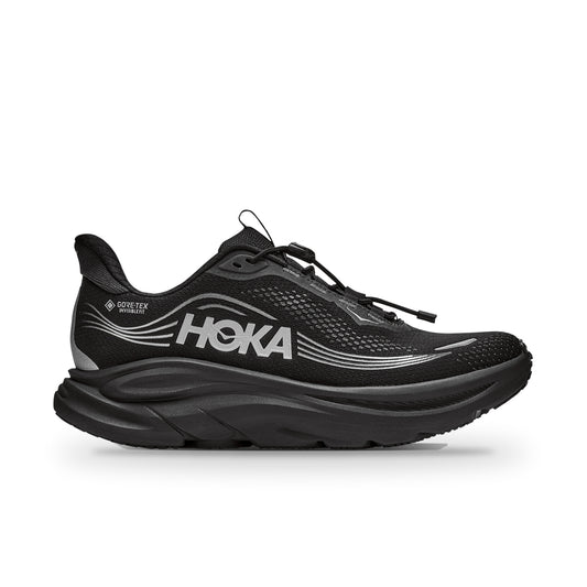 HOKA Clifton 11 GTX side view in Black/Black with silver HOKA logo, GORE-TEX tag and quick-lace toggle