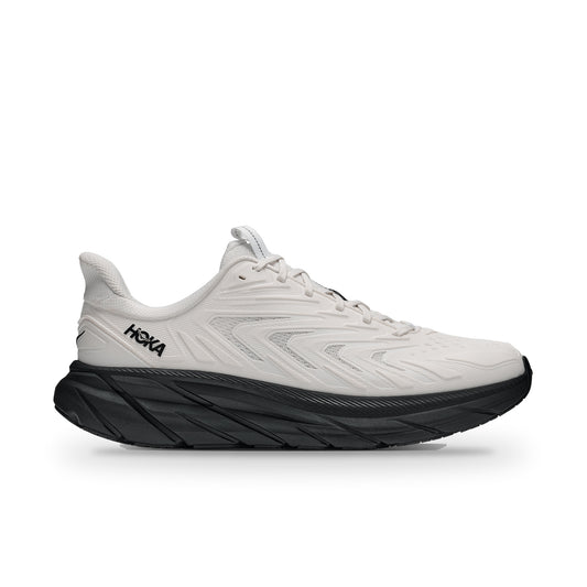 HOKA Clifton UTL side view in Frost/Black, off-white layered upper with black HOKA logo and thick black midsole