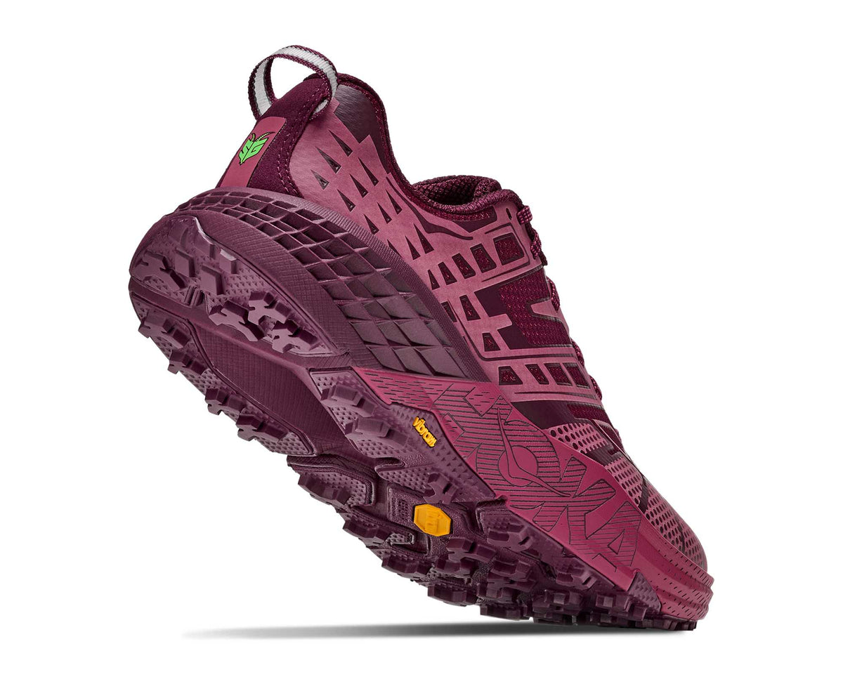 HOKA Speedgoat 2 TS angled view of the sole showing Vibram lugs, Pink Punch/Cherry Syrup mesh upper and heel loop