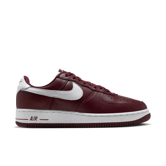 Nike Air Force 1 '01 side view in Dark Team Red leather with white Swoosh, white midsole and red AIR logo