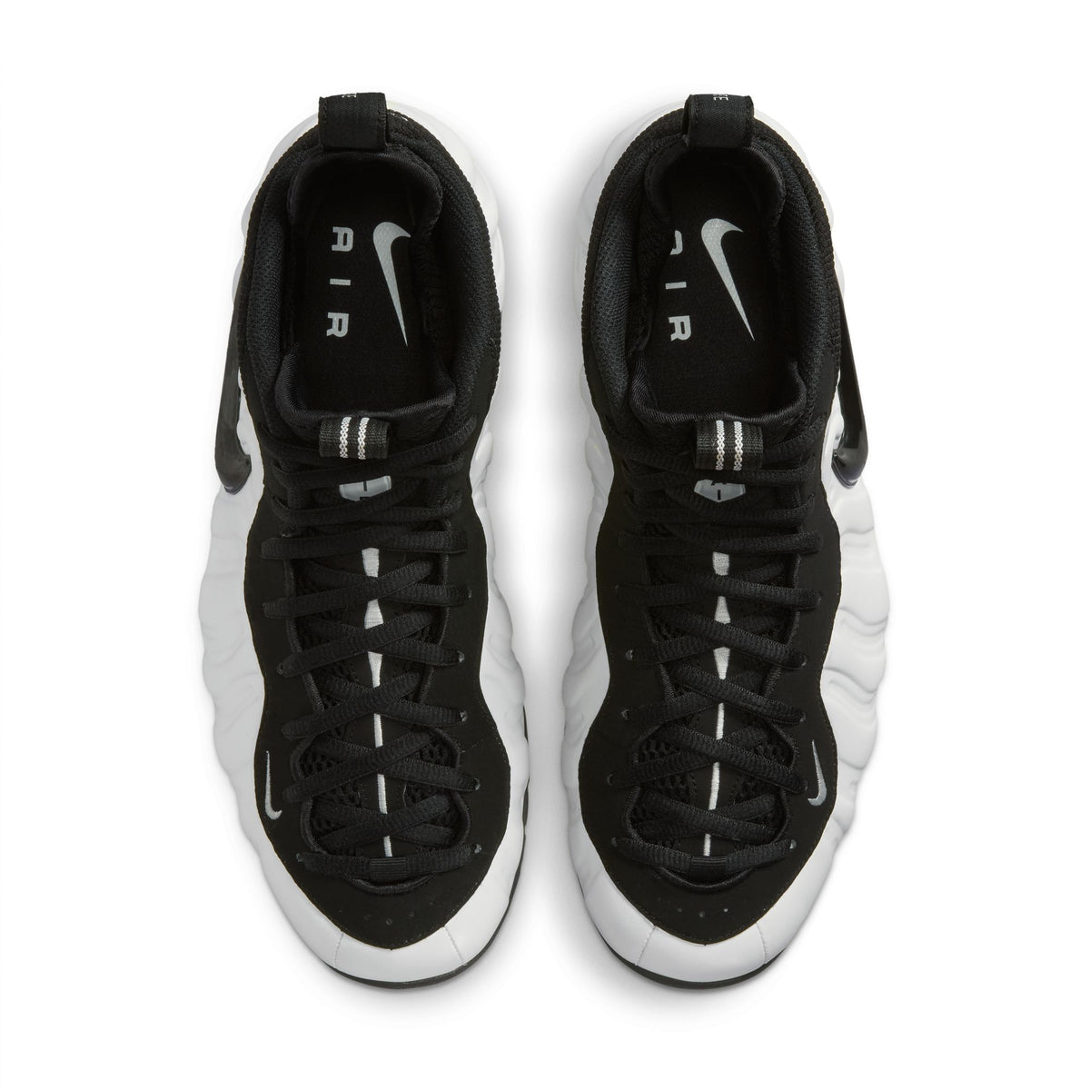 Nike Air Foamposite Pro top view of pair in Summit White/Black, black nubuck uppers and laces, Air insoles