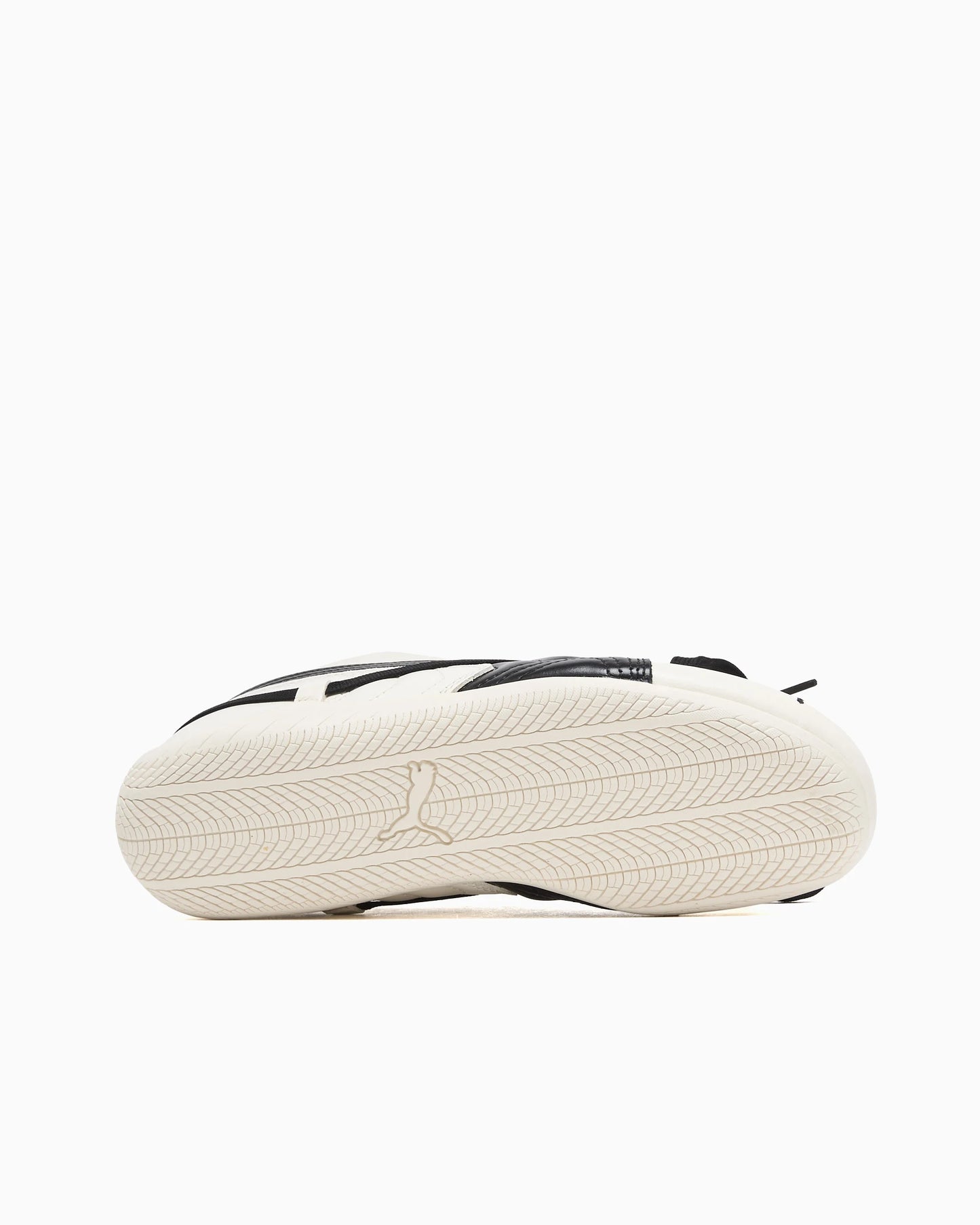 Tire inspired sole shot of the Puma sneaker with a white backdrop.