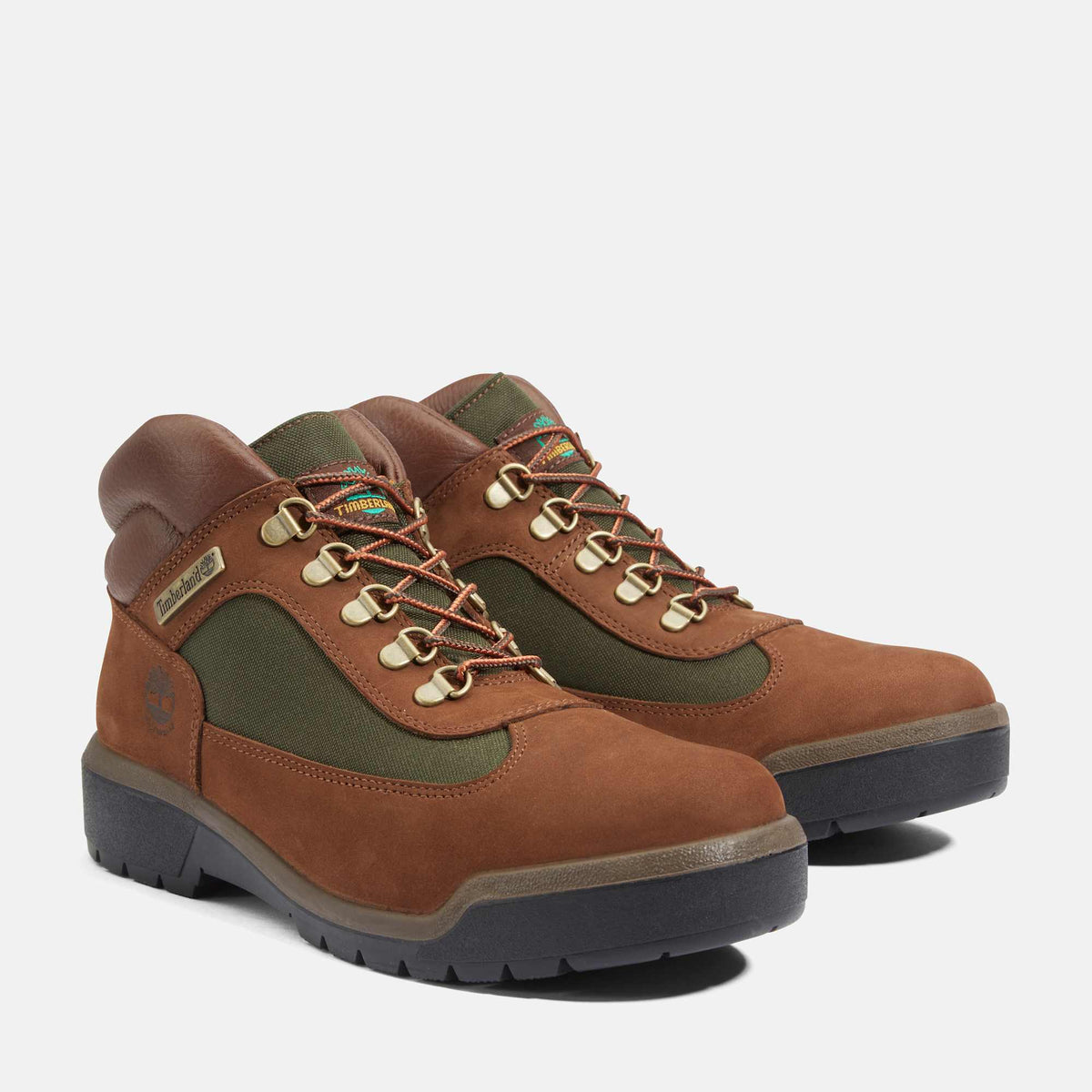 Timberland Field Boot pair in Dark Brown Nubuck with olive canvas panels, brass hooks and black lug soles