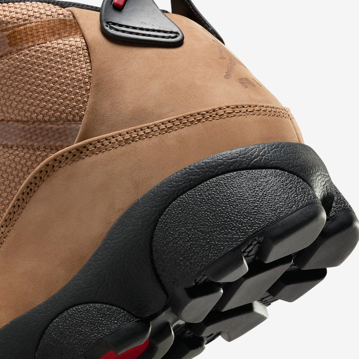 Jordan Winterized 6 Rings close-up of heel in Rocky Tan nubuck with woven panel and black lugged sole