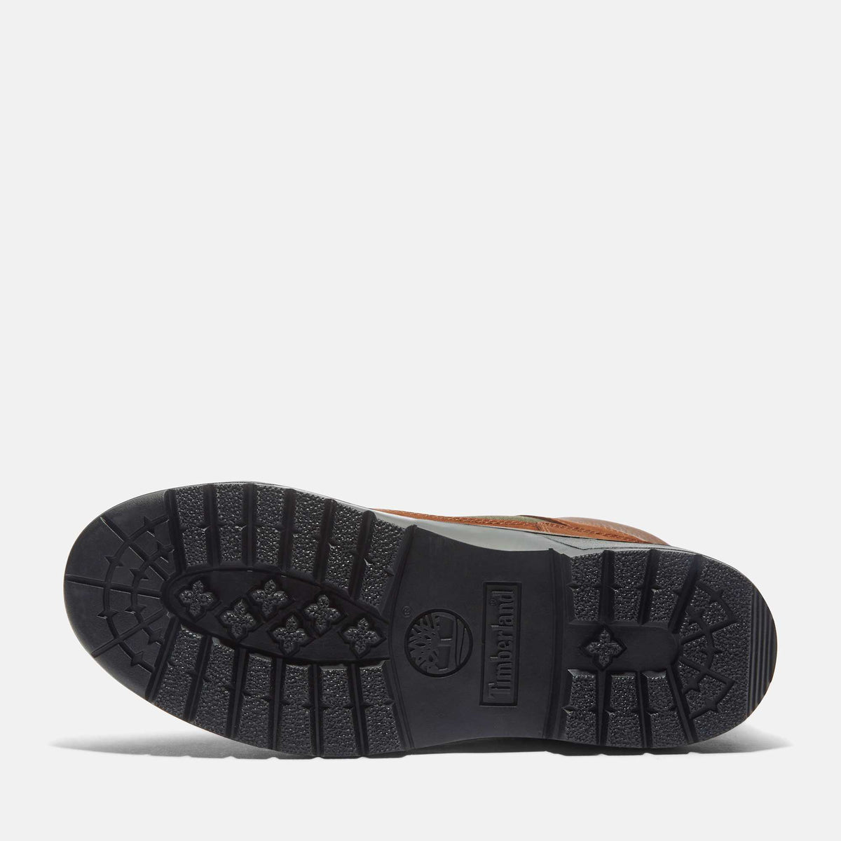 Timberland Field Boot sole view, black lugged rubber outsole with tree logo, Dark Brown Nubuck upper edge