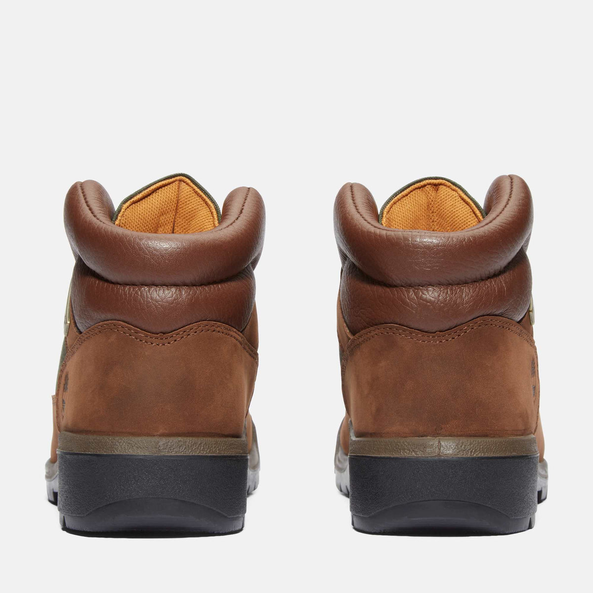 Timberland Field Boot back view of pair in Dark Brown Nubuck with padded leather collars and black rubber soles